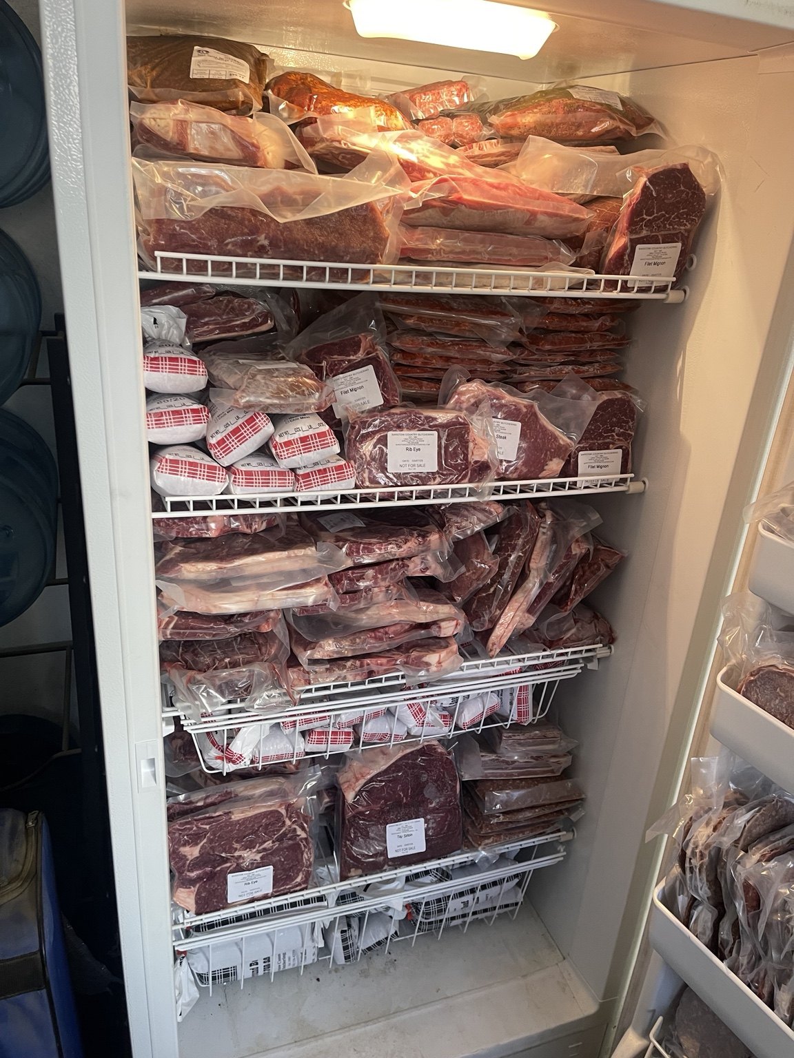 Freezer filled with packaged West Coast Cattle beef